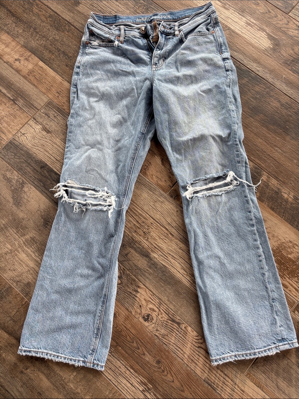 American Eagle Outfitters Light Blue Boot Cut Jeans with Knee Rips